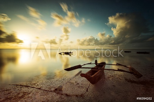 Picture of Traditional fisher boat in Zanzibar on a white beach at a beauti